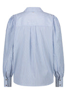 Back view of a light blue striped blouse with gathered yoke and full sleeves, finished with buttoned cuffs.