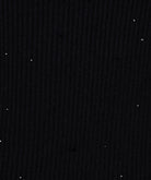 Dark textured fabric with small white dots