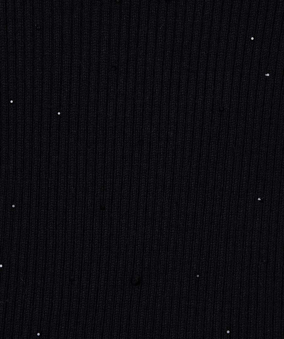 Dark textured fabric with small white dots