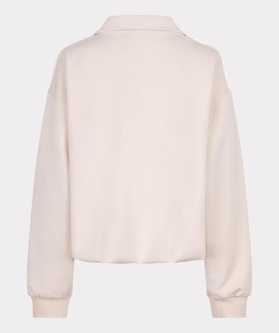 Light beige sweatshirt on a white background off figure