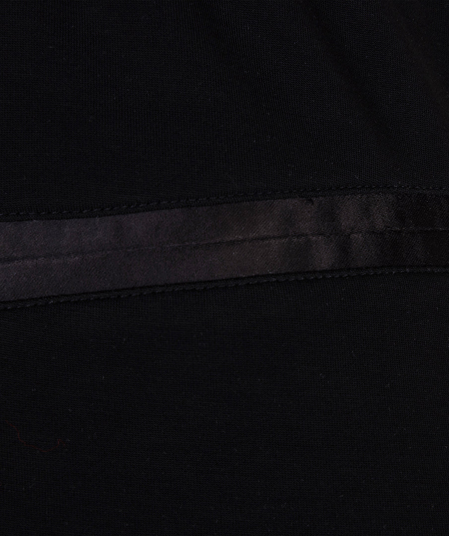 Close-up of a black model fabric texture with a subtle pattern