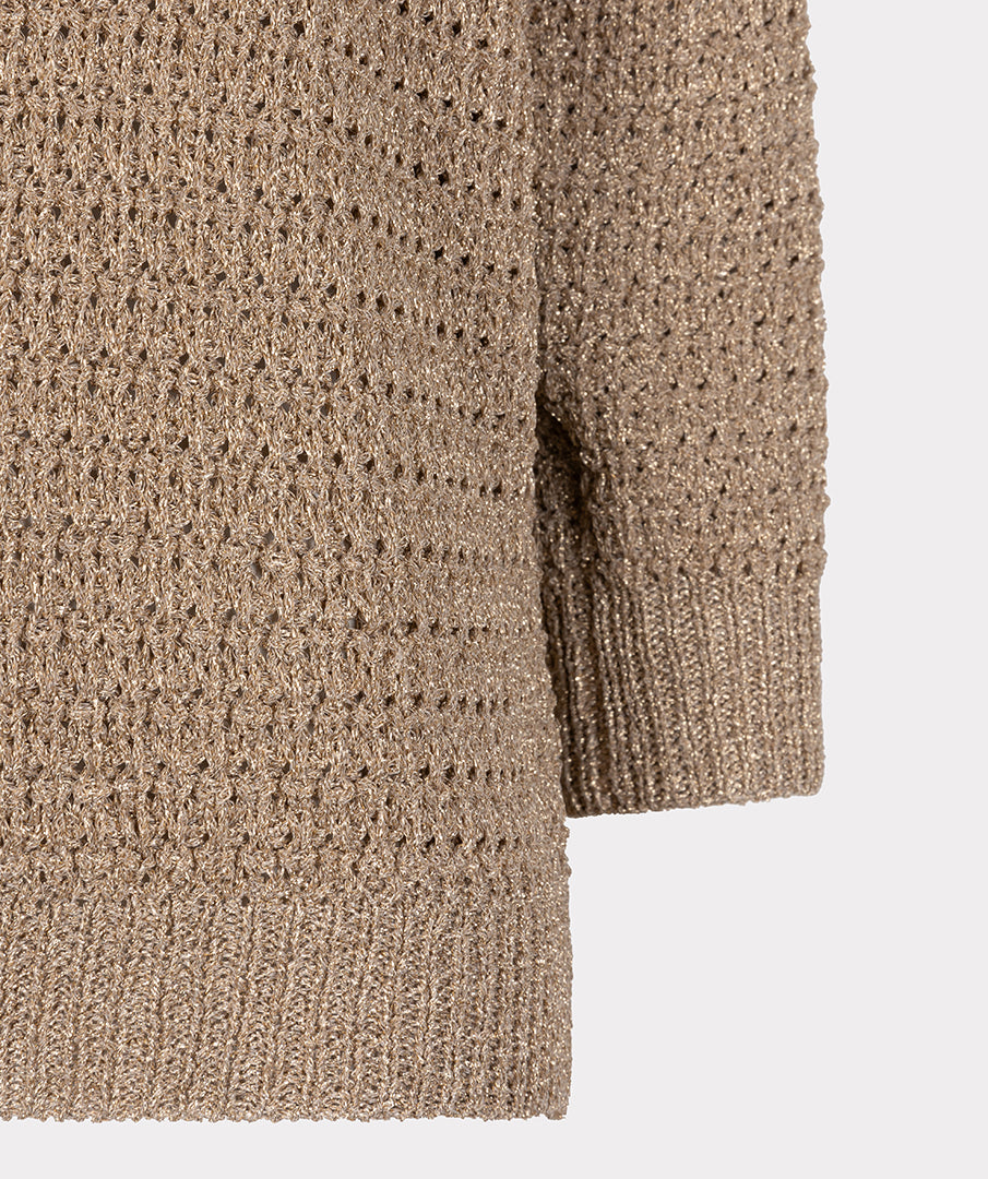 Close-up of a brown knitted sweater with a subtle pattern on a light gray background