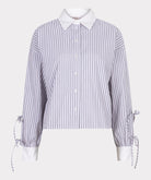 Striped shirt with tied sleeves on a white background