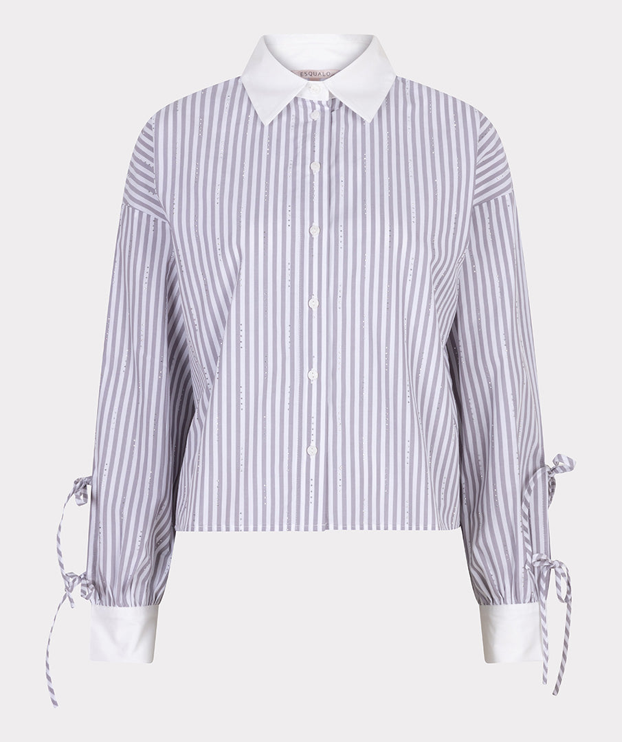 Striped shirt with tied sleeves on a white background