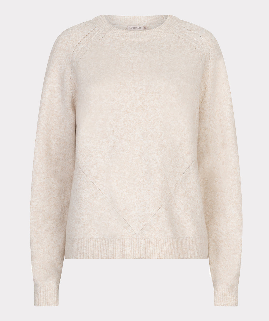 Beige sweater on a light gray background